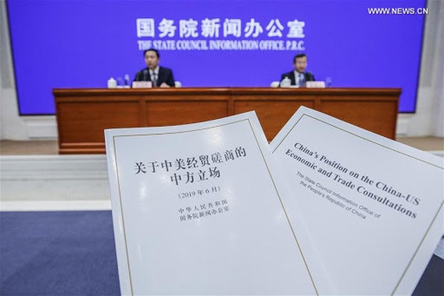 Trung Quốc công bố sách trắng về Covid-19, bác bỏ các vụ kiện cáo, bồi thường - Ảnh 1.