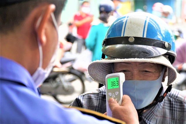 Ảnh: Ngày đầu người dân Đà Nẵng thực hiện đi chợ bằng phiếu ngày chẵn lẻ - Ảnh 15.