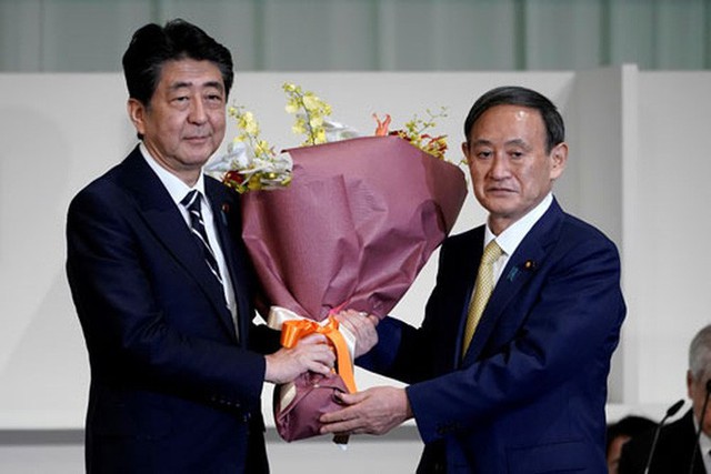 Tiến sát ghế thủ tướng Nhật Bản, ông Suga tuyên bố không nhượng bộ Trung Quốc  - Ảnh 1.
