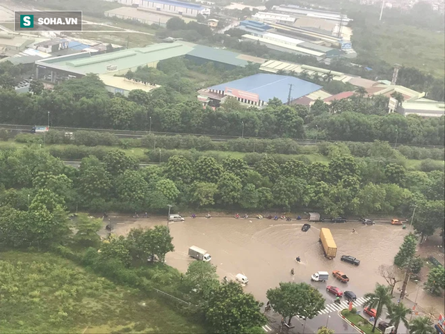 Hà Nội: Đại lộ Thăng Long - Vành đai 3 ngập nghiêm trọng, ô tô đi trong biển nước - Ảnh 14.
