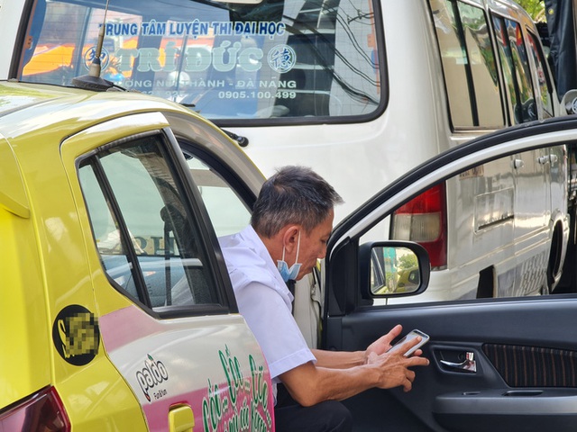 Đà Nẵng: Xe buýt vắng khách, tài xế taxi rầu rĩ - Ảnh 5.