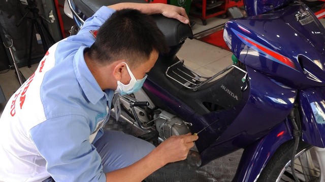 Cận cảnh điểm đo khí thải, đổi xe máy cũ lấy xe mới ở Hà Nội - Ảnh 12.