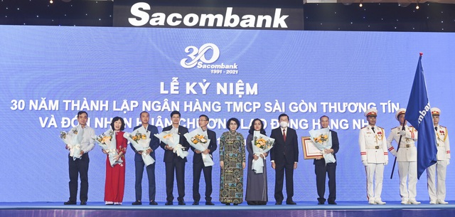 Sacombank đón nhận Huân chương Lao động hạng Nhì vào dịp kỷ niệm 30 năm thành lập  - Ảnh 1.