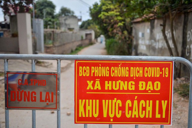  Có phải ai ở vùng dịch Covid-19 về quê ăn Tết cũng phải cách ly?  - Ảnh 2.