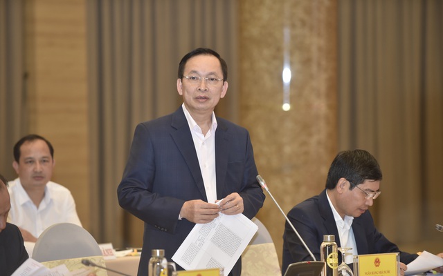 Phó Thông đốc NHNN Đào Minh Tú trả lời các câu hỏi của phóng viên. Ảnh: VGP/Nhật Bắc