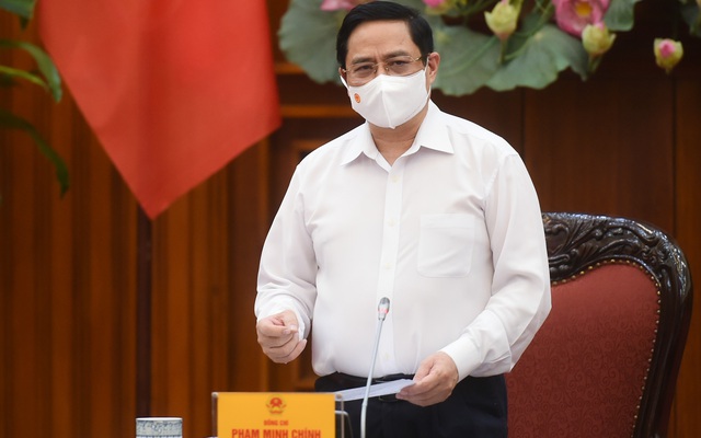 Thủ tướng Phạm Minh Chính chủ trì cuộc họp Thường trực Chính phủ về phòng, chống dịch COVID-19 diễn ra sáng 26/4 - Ảnh VGP.