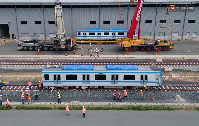 TP.HCM: Toàn cảnh lắp ráp đoàn tàu Metro số 1 nặng 37 tấn vào đường ray, sẵn sàng chạy thử - Ảnh 13.