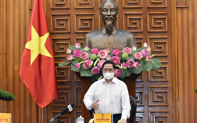 Thủ tướng Chính phủ Phạm Minh Chính phát biểu kết luận cuộc họp của Thường trực Chính phủ về phòng chống COVID-19, chiều 24/5. Ảnh: VGP/Nhật Bắc