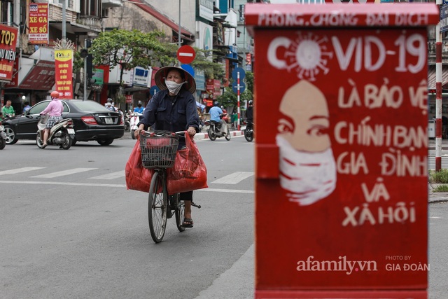 Bốt điện ở Hà Nội biến thành tác phẩm nghệ thuật đường phố tôn vinh các chiến sĩ áo trắng chống dịch - Ảnh 9.