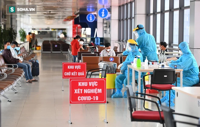  [ẢNH]: Cận cảnh dịch vụ test nhanh Covid-19 trong 30 phút ở sân bay Nội Bài cho hành khách đi TP.HCM - Ảnh 5.