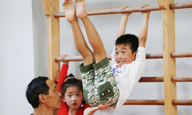 Giấc mơ vô địch Olympic của những đứa trẻ ở lò đào tạo thể thao Trung Quốc: Đánh đổi tuổi thơ bằng máu, mồ hôi và nước mắt  - Ảnh 14.