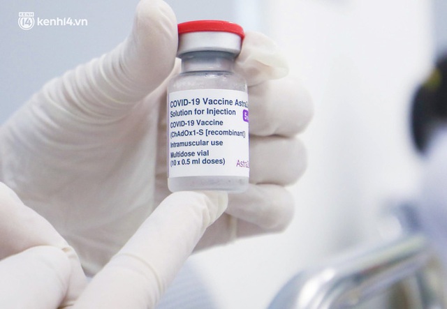 Ảnh: Hà Nội lập vách ngăn riêng biệt, tiêm vắc-xin cho người dân phòng dịch Covid-19 - Ảnh 10.