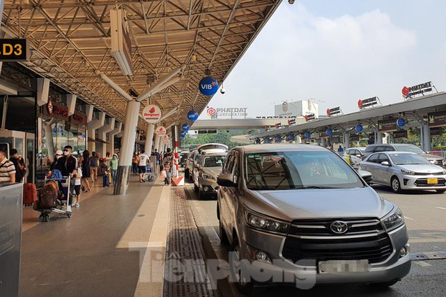 26 tháng Chạp, sân bay Tân Sơn Nhất không còn nóng hầm hập người về quê ăn Tết - Ảnh 8.