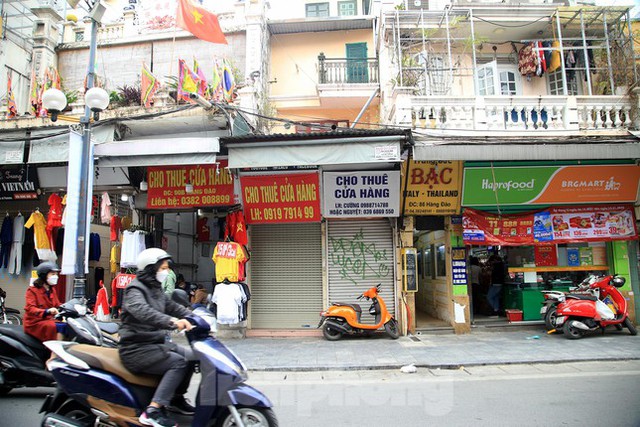  Hàng quán nghỉ Tết sớm, phố phường Hà Nội vắng lặng cuối tuần  - Ảnh 5.