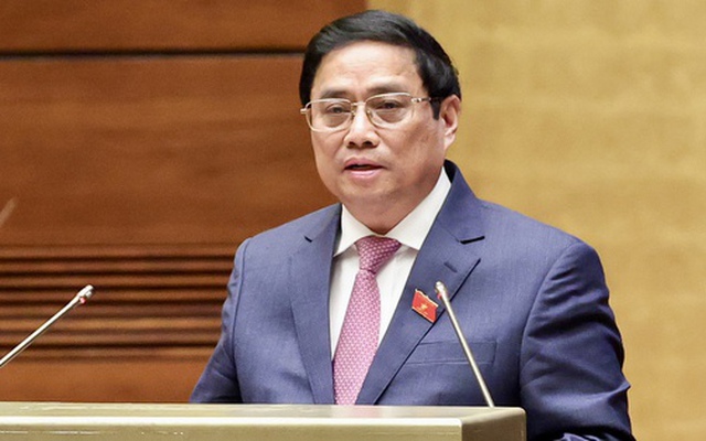 Thủ tướng Phạm Minh Chính trình bày Báo cáo kết quả thực hiện kế hoạch phát triển kinh tế-xã hội năm 2022; dự kiến kế hoạch phát triển kinh tế-xã hội năm 2023 - Ảnh: VGP/Nhật Bắc