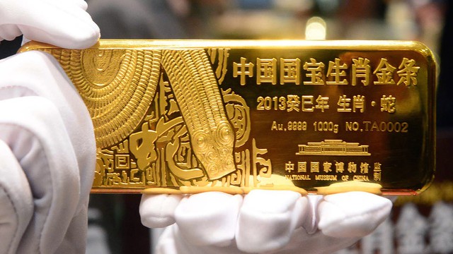 Tín hiệu từ việc Trung Quốc mua 32 tấn vàng, lần đầu bổ sung dự trữ sau 3 năm - Ảnh 1.