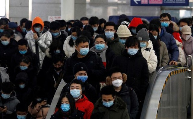 Trung Quốc nín thở chờ đỉnh dịch COVID-19 - Ảnh 1.