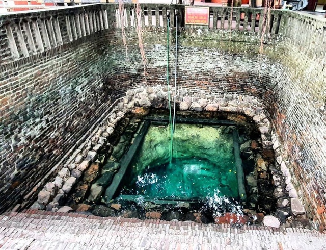 The mystery of the magic fish in the jade-colored ancient well, the natural sweetness in the village of Diem - Photo 4.