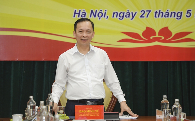 Phó Thống đốc NHNN Đào Minh Tú chủ trì Hội nghị. Ảnh: SBV