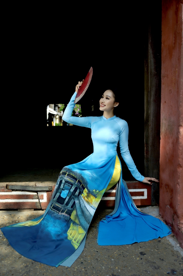 Áo dài lụa vẽ của NTK, nghệ nhân Trung Đinh mang đậm tâm hồn Việt, hút hồn Miss Global International 2019 - Ảnh 3.