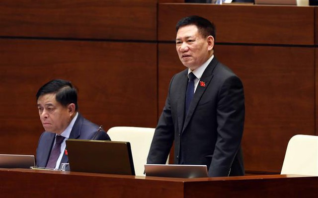 Bộ trưởng Bộ Tài chính Hồ Đức Phớc phát biểu giải trình trước Quốc hội sáng 2/6. Ảnh: Phạm Kiên/TTXVN.