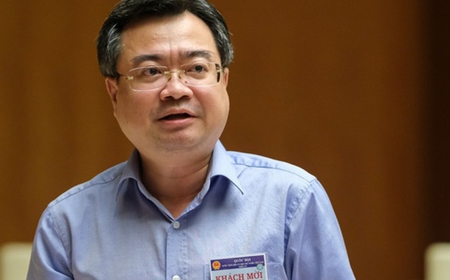 Bộ trưởng Nguyễn Thanh Nghị phát biểu làm rõ một số nội dung về lĩnh vực bất động sản - Ảnh: Quochoi.vn