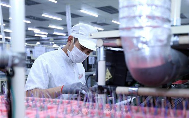 Dây chuyền sản xuất bản mạch điện tử tại Công ty TNHH Nexcon Việt Nam, vốn đầu tư của Hàn Quốc tại Bắc Ninh. Ảnh: Danh Lam/TTXVN