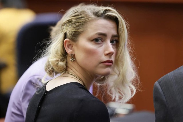 Amber Heard đệ đơn 43 trang yêu cầu hủy bỏ phán quyết vụ kiện với Johnny Depp - Ảnh 1.