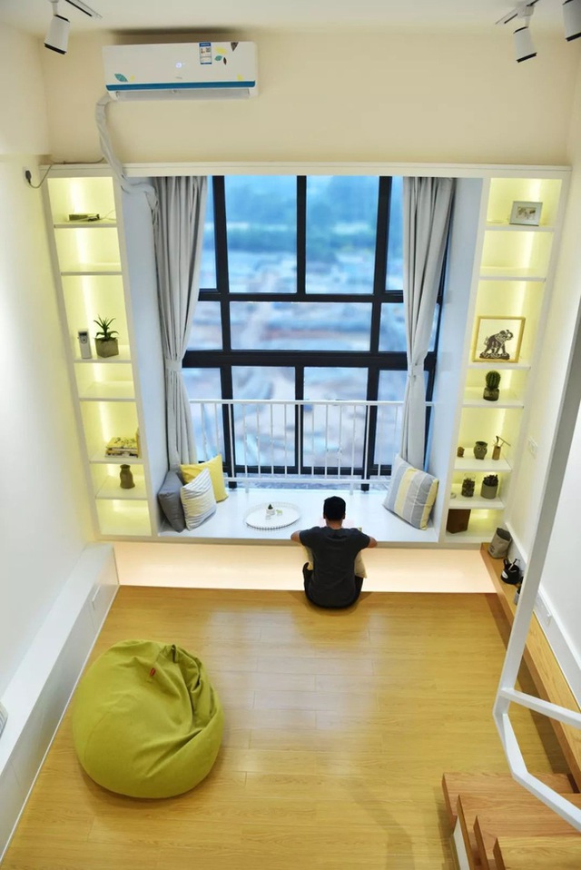 Căn hộ 52m² được thiết kế ấn tượng với cách bố trí nội thất giật cấp tiện lợi - Ảnh 2.