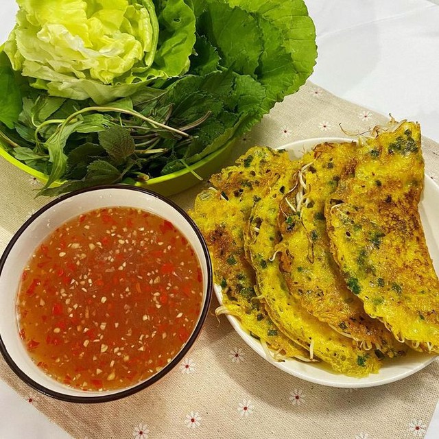 Việt Nam có 8 món ăn được báo nước ngoài khen ngợi: Toàn đặc sản đến khách Tây phải “nghiện” - Ảnh 10.