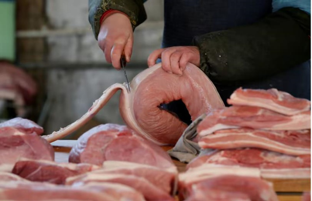 Trung Quốc chiến đấu với lạm phát thịt lợn - Ảnh 1.