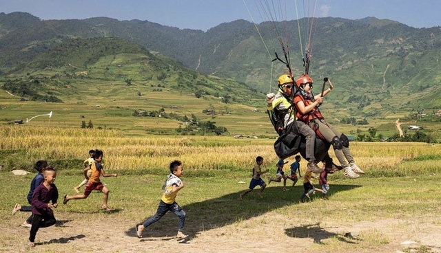 Paragliding at Mu Cang Chai attracts young people, an interesting flying experience that should be tried once in a lifetime - Photo 7.