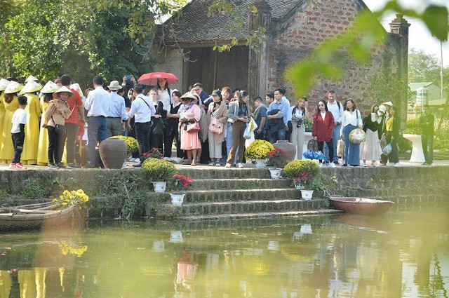 Trải nghiệm Tết Việt hút khách quốc tế tại làng cổ Đường Lâm - Ảnh 9.