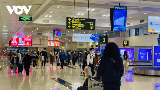 Hơn 75.000 lượt khách qua sân bay Nội Bài trong ngày 26 Tết - Ảnh 12.