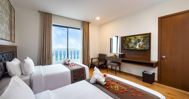 Du lịch Tết: Loạt khách sạn ở Nha Trang sát biển, tầm nhìn đẹp, giá giảm mạnh tới 82% - Ảnh 5.
