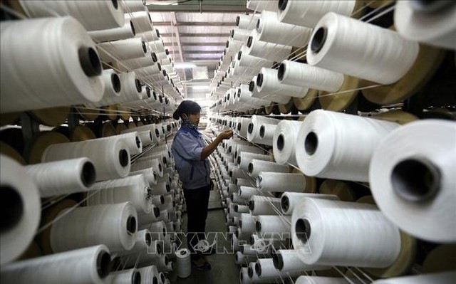 Dây chuyền sản xuất sợi của Công ty Cổ phần KSA Polymer Hà Nội, 100% vốn đầu tư của Hàn Quốc, tại Khu công nghiệp Thuỵ Vân (Phú Thọ). Ảnh minh họa: Danh Lam/TTXVN