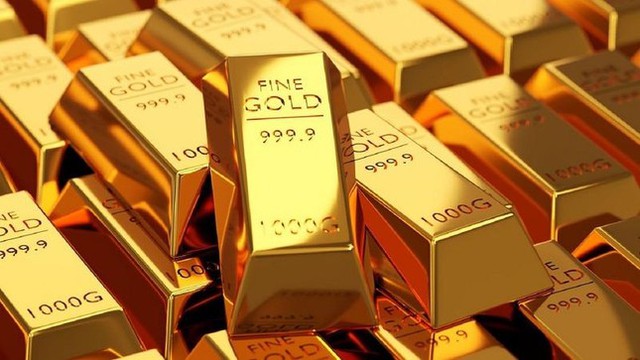 Vàng thế giới đạt đỉnh 6 tháng, vàng trong nước giảm giá - Ảnh 1.