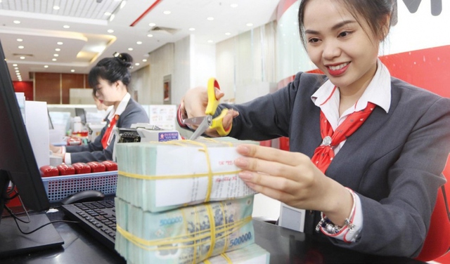 Tỷ lệ CAR của các ngân hàng tại Việt Nam đang tiệm cận với tiêu chuẩn thế giới - Ảnh 1.