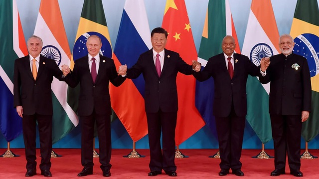 Hội nghị thượng đỉnh thường niên của BRICS sẽ không thảo luận về việc phát triển đồng tiền chung mới để thách thức sự thống trị của đồng đô la Mỹ. Ảnh: news.bitcoin.com