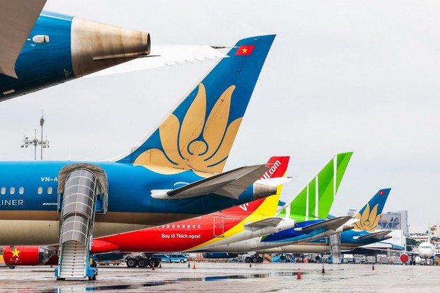 Cục Hàng không yêu cầu xem xét tăng tải cung ứng trên các đường bay từ Hà Nội, TP. HCM dịp nghỉ Lễ 30/4-1/5- Ảnh 1.