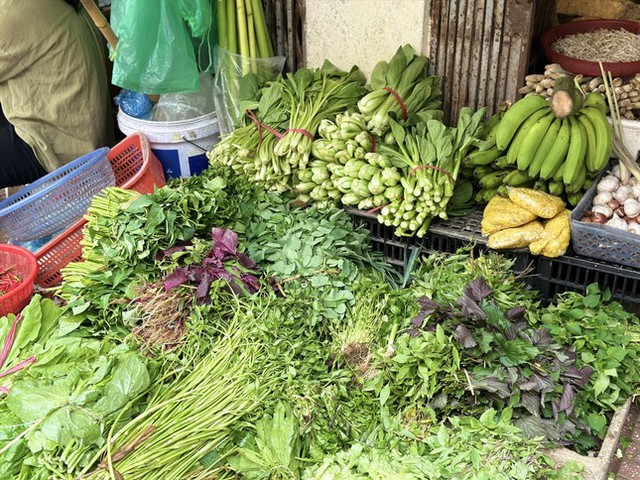 Sau bão lũ: Chặn đà tăng giá, ngăn lạm phát- Ảnh 1.