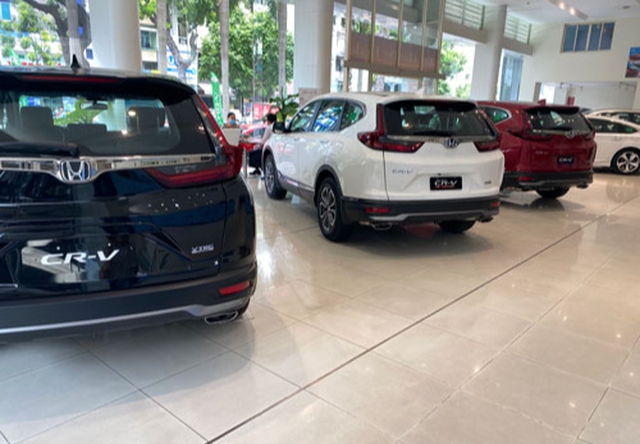 Đề xuất giảm lệ phí đăng ký ô tô: Chưa đủ kích sức mua - Ảnh 1.