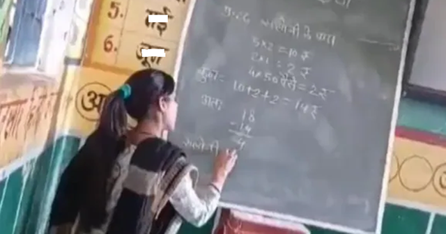 Đình chỉ cô giáo, đang giờ thi viết đáp án lên bảng cho học sinh chép