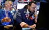 Dow Jones rớt hơn 300 điểm, Phố Wall tiếp tục trải qua một tuần đầy biến động do Covid-19