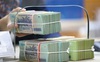 2 lý do khiến ngân hàng bất ngờ giảm lãi suất tiền gửi