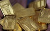 Nhà đầu tư bán mạnh vàng dù bất ổn nội tại Mỹ gia tăng