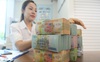 NIM ngân hàng tăng mạnh: Lãi suất cho vay chưa giảm tương ứng với lãi suất huy động