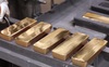 Chống lại xu thế, vàng trong nước “cố thủ” mốc 57 triệu đồng/lượng