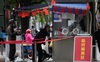 Singapore, Trung Quốc đối đầu làn sóng COVID-19 mới