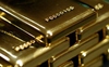 Giá vàng tuần tới tiếp tục giảm về dưới 1.600 USD/oz?